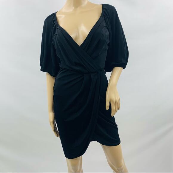 bebe Dresses & Skirts - Bebe Black Wrap Mini Dress
